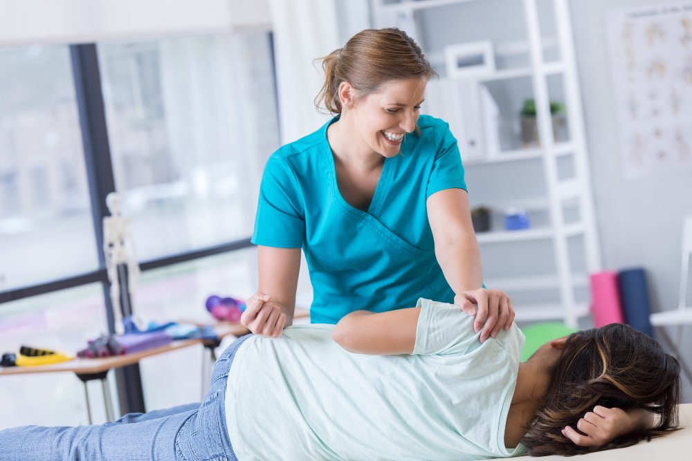 Young girl receiving chiropractic adjustment in Crofton, MD