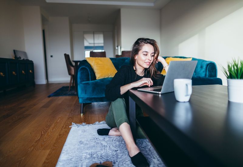 Women working on laptop at home