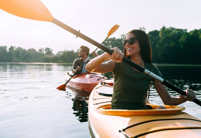 Couple riding kayaks in Maryland