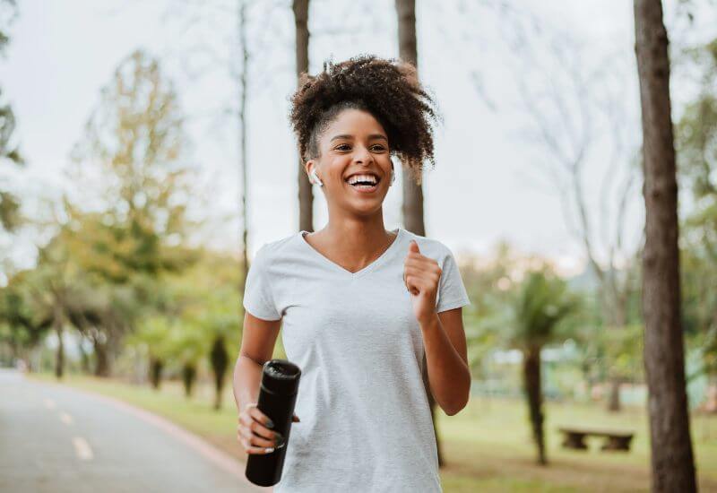 Woman running at park