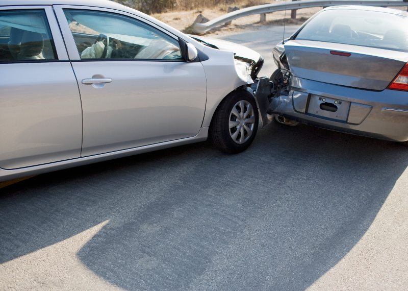 Two car collision on roadway